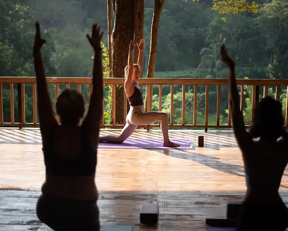 Yoga class on the forest deck